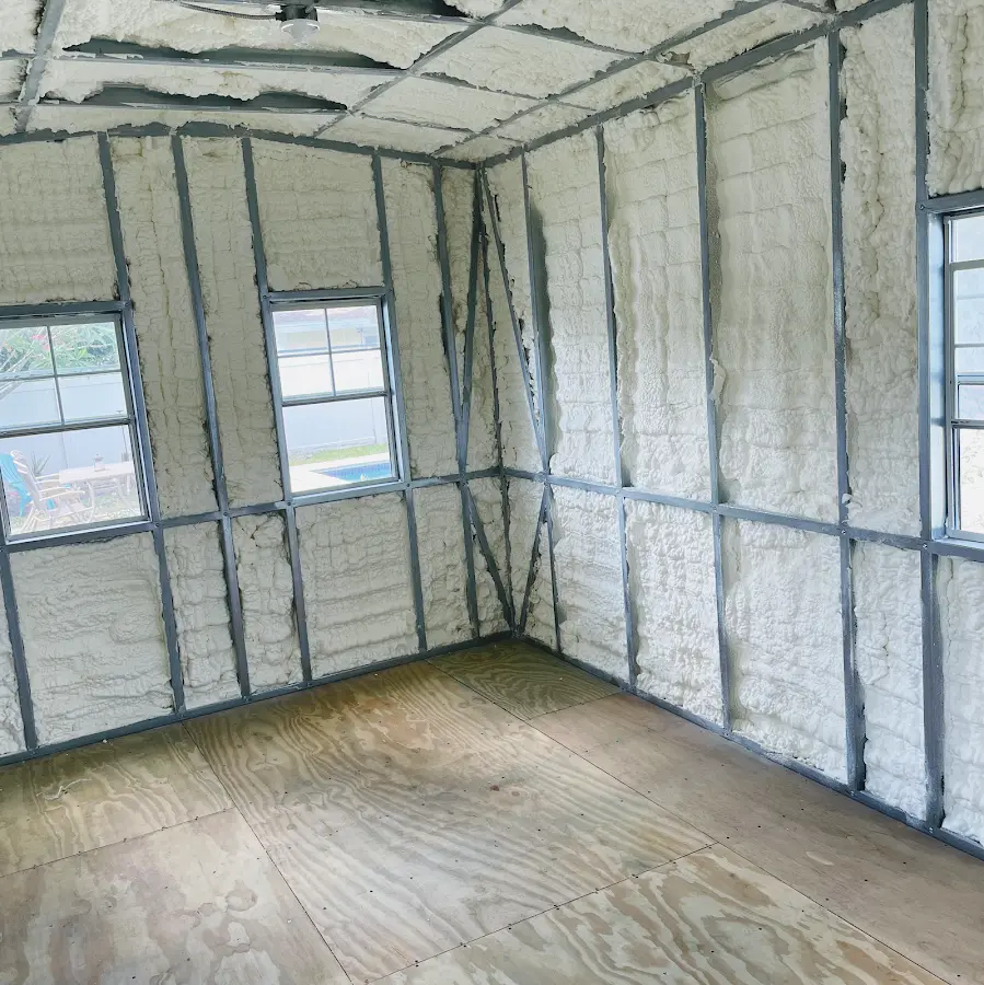 Closed-cell spray foam insulation applied to wall cavities in a residential project in Duncan